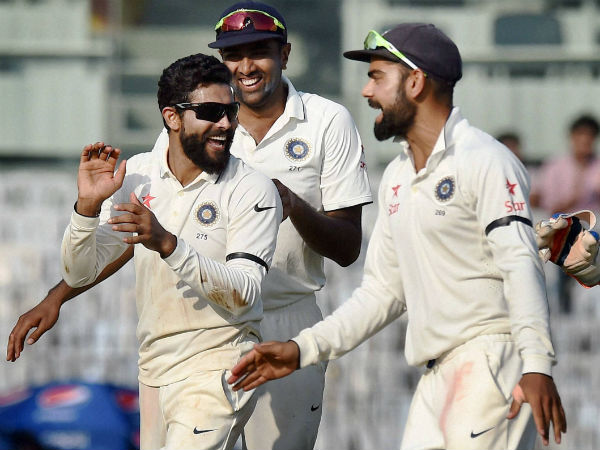 From left: Ravindra Jadeja, R Ashwin and Virat Kohli celebrate a wicket
