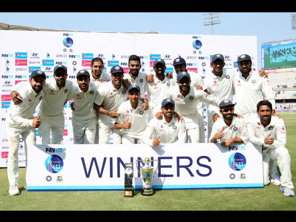Team India pose with the trophy