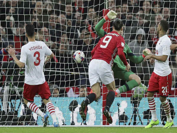 Zlatan Ibrahimovic (centre) scores the winning goal for Manchester United