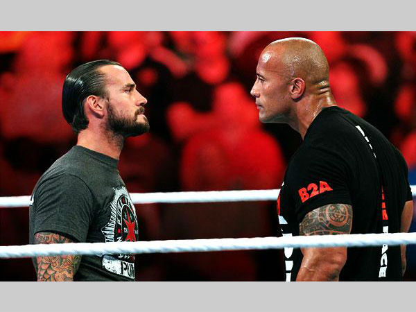 CM Punk (left) and The Rock (image courtesy WWE)CM Punk (left) & The Rock (image courtesy WWE) CM Punk (left) and The Rock (image courtesy WWE)CM Punk (left) & The Rock (image courtesy WWE)