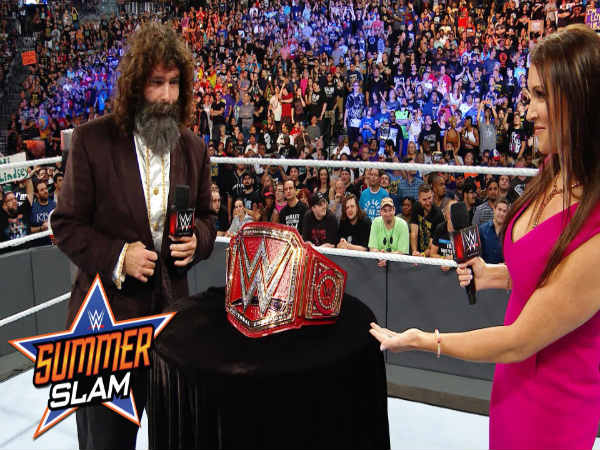 Mick Foley (left) and Stephanie McMahon (Image courtesy: Youtube) Mick Foley (left) and Stephanie McMahon (Image courtesy: Youtube)