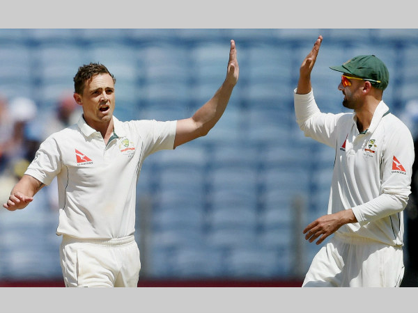 O'Keefe (left) celebrates with Nathan Lyon after dismissing Murali Vijay
