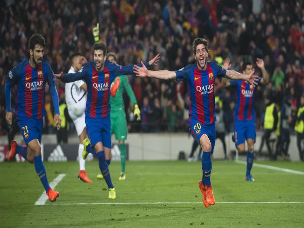 Sergio Roberto (right) celebrate after scoring winning goal