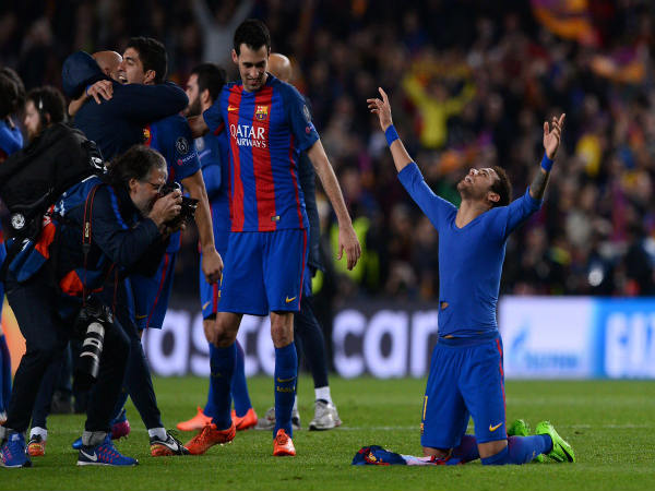 Neymar (left) celebrates after winning the tie