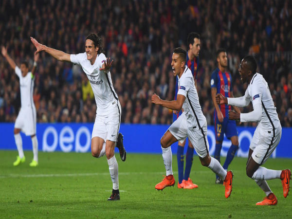 Edinson Cavani (left) celebrates after scoring a goal