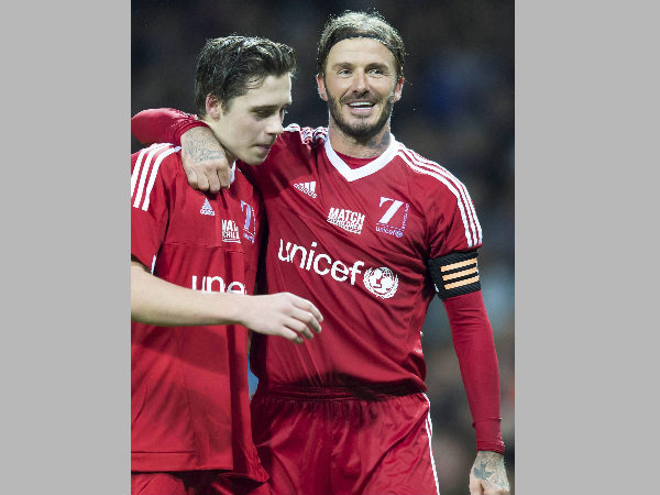 David Beckham (right) with his son Brooklyn