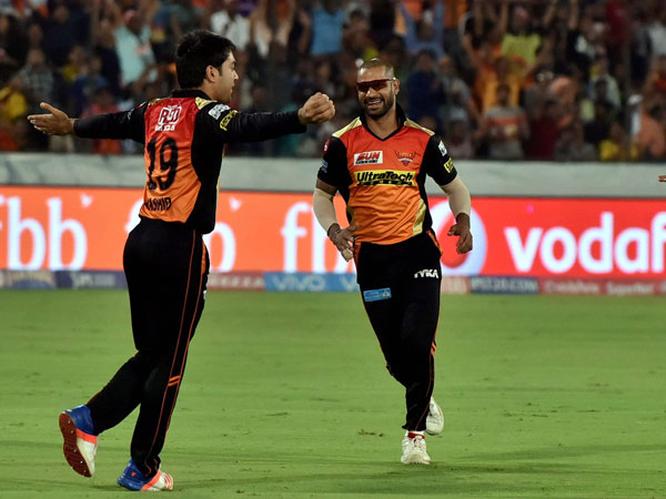 Rashid Khan (left)