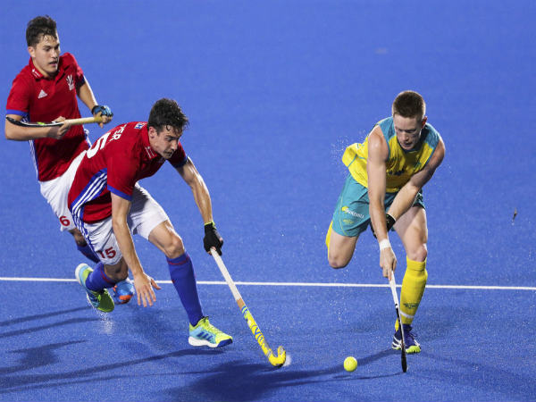Great Britain players (red jersey) and Australian player