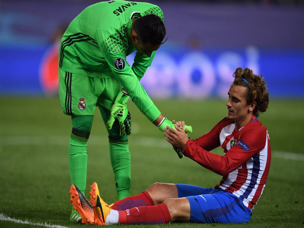 Keylor Navas (left) consoles Antoine Griezmann