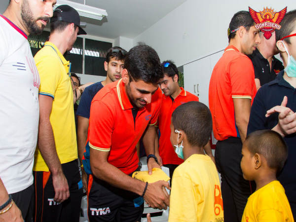 Bhuvneshwar meets one of the kids (Image courtesy: SRH Twitter handle)
