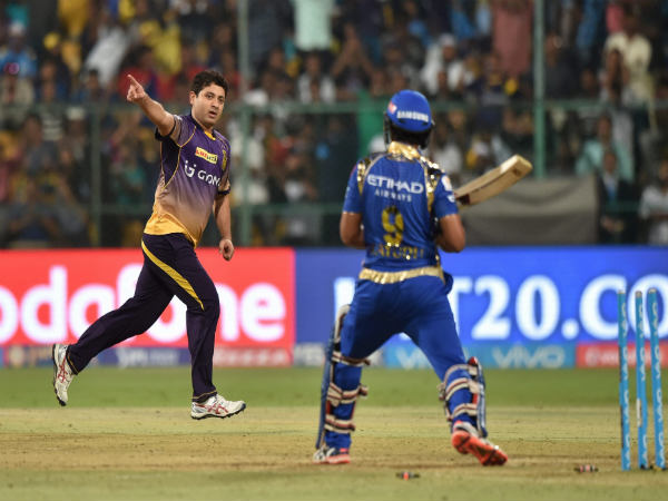 Piyush Chawla (left) celebrates a wicket
