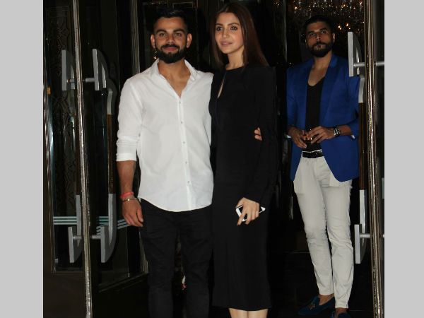 Virat-Anushka pose for camera persons