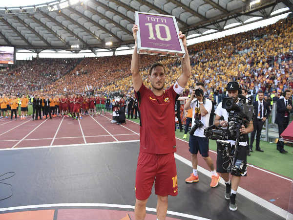 Francesco Totti flaunts his memento