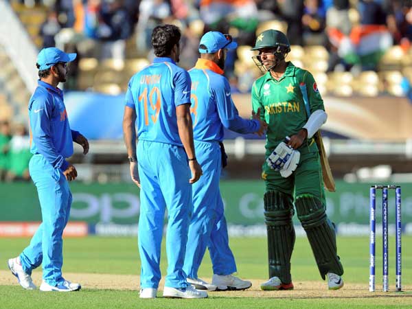 Indian players shake hands with Shadab Khan Indian players shake hands with Shadab Khan
