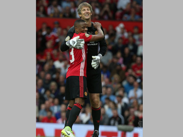 Patrice Evra (left) with Edwin van der Sar