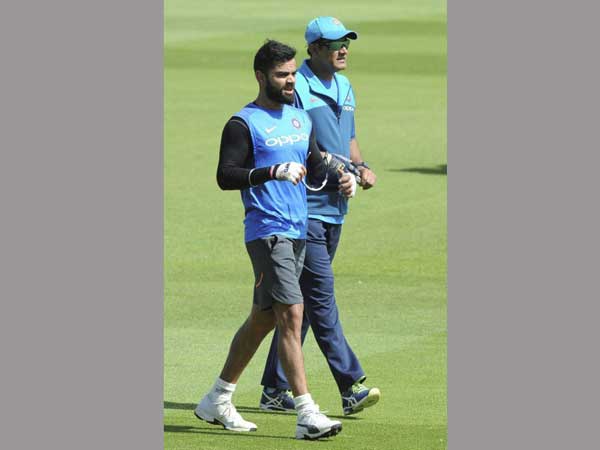 Virat Kohli (left) and Anil Kumble