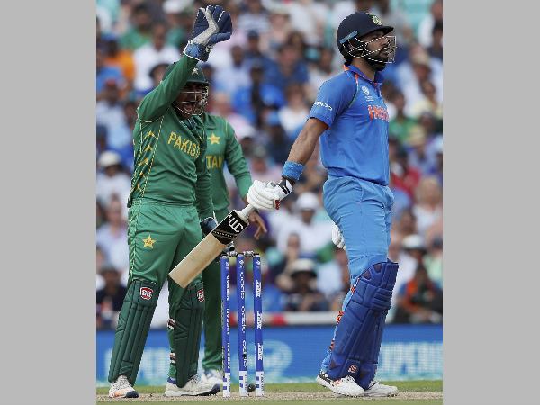 Yuvraj Singh (right)