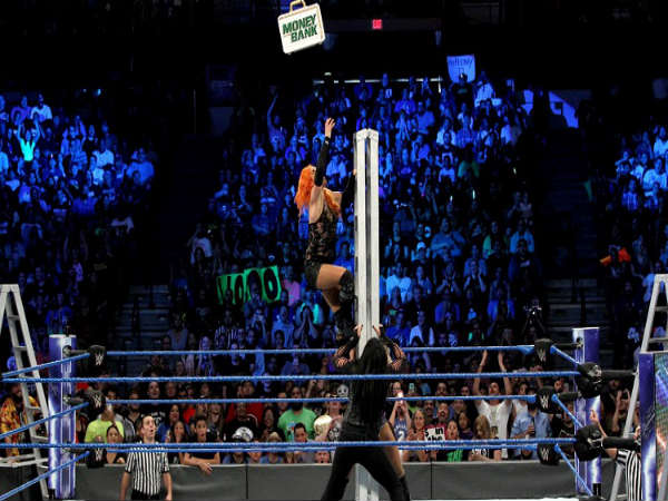 Becky Lynch (above) grabbing the MITB briefcase (Image courtesy: wwe.com) Becky Lynch (above) grabbing the MITB briefcase (Image courtesy: wwe.com)