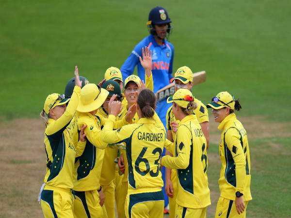 Australian players (yellow) celebrate (Image courtesy: ICC Twitter handle) Australian players (yellow) celebrate (Image courtesy: ICC Twitter handle)