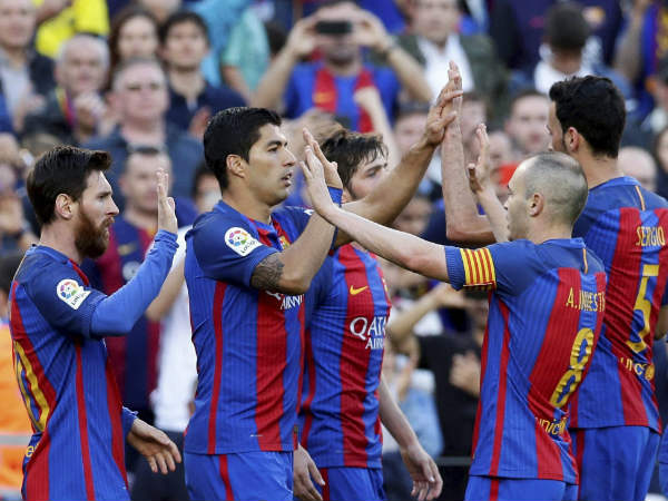 File photo: Barcelona players celebrate a goal File photo: Barcelona players celebrate a goal