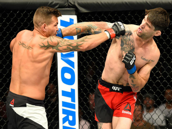 Ryan Janes (right) of Canada punches Jack Marshman of Wales (Image Courtesy: UFC website)