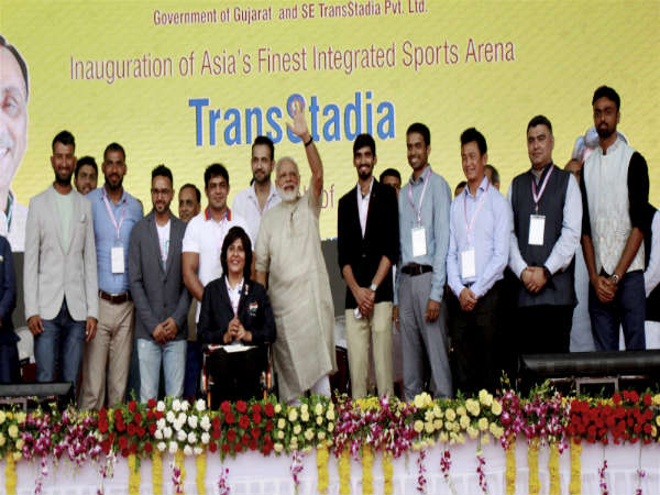 Narendra Modi (centre) with several Indian sportspersons