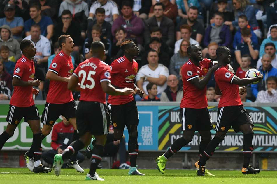 Manchester United celebrate Eric Bailly's opener against Swansea City Manchester United celebrate Eric Bailly's opener against Swansea City