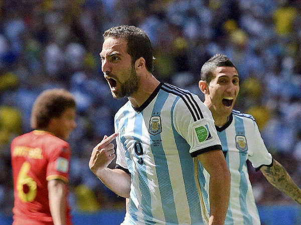 Argentina's Gonzalo Higuain, left, celebrates with Angel di Maria after scoring in a match