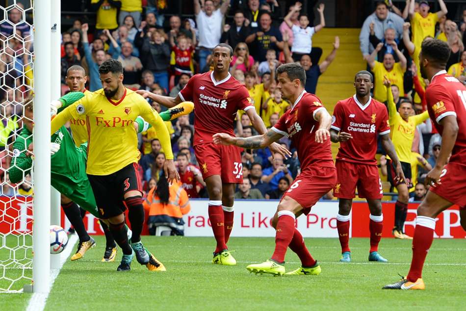 Watford's Miguel Britos celebrates the equaliser against Liverpool Watford's Miguel Britos celebrates the equaliser against Liverpool