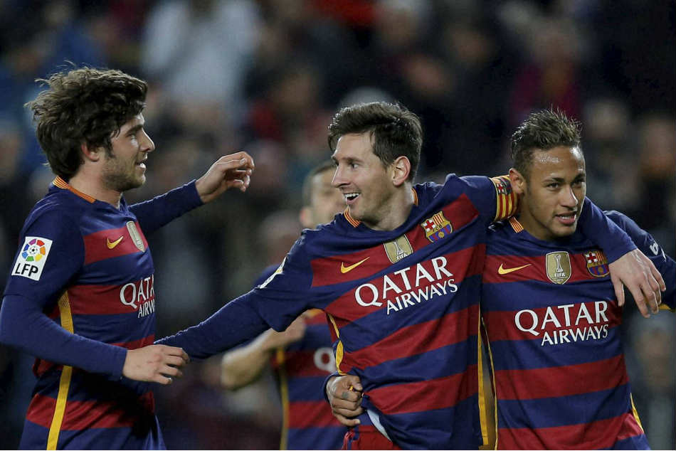 FC Barcelona's Lionel Messi, center, celebrates his goal with Sergi Roberto, left, and former teammate Neymar, right, after scoring against Valencia last season FC Barcelona's Lionel Messi, center, celebrates his goal with Sergi Roberto, left, and former teammate Neymar, right, after scoring against Valencia last season