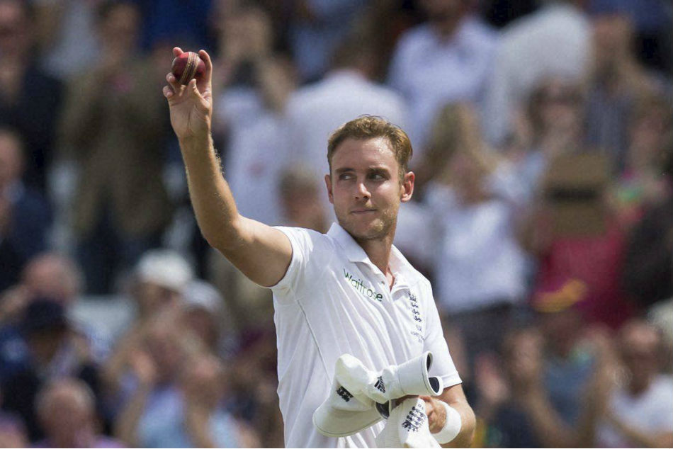 England's Stuart Broad raises the ball