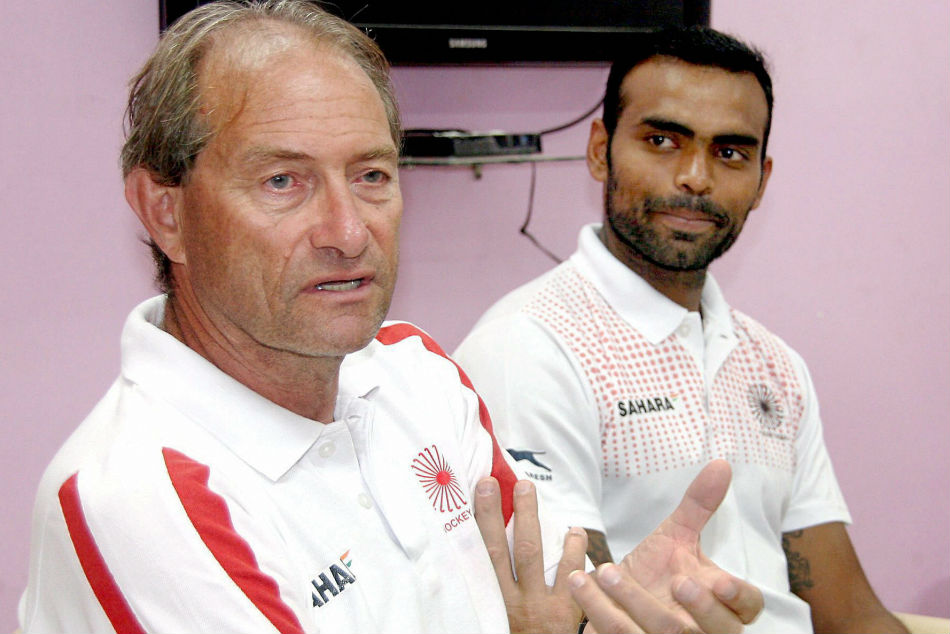 Former Hockey India chief Coach Roelant Oltmans (L) along with captain P R Sreejesh Former Hockey India chief Coach Roelant Oltmans (L) along with captain P R Sreejesh