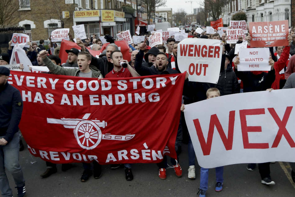 Arsenal fans march calling for the resignation of Arsene Wenger Arsenal fans march calling for the resignation of Arsene Wenger