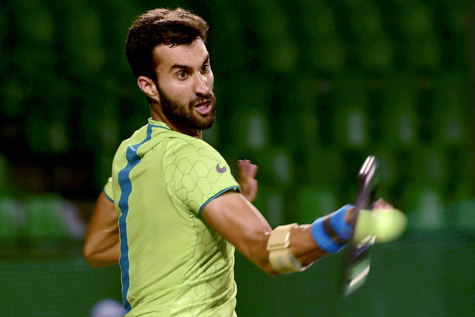 Yuki Bhambri returns to Sriram Balaji during his first-round match at the Bengaluru Open ATP Challenger on Tuesday