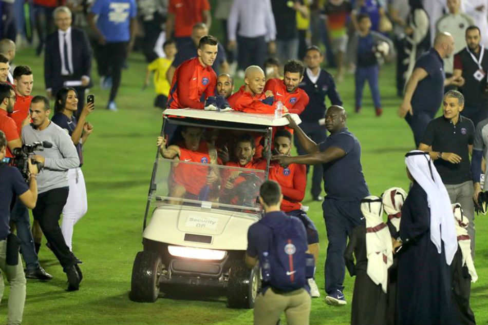 PSG players arrive for training at Aspire Academy in golf carts 