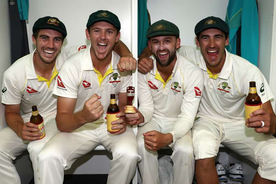 Australian players celebrate after reclaiming the Ashes Australian players celebrate after reclaiming the Ashes