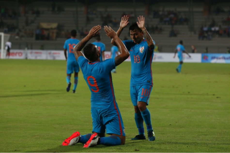 Robin Singh (left) of India celebrates with teammate Jackichand Singh after scoring against Mauritius in the Champions Cup (Image courtesy: AIFF Media)