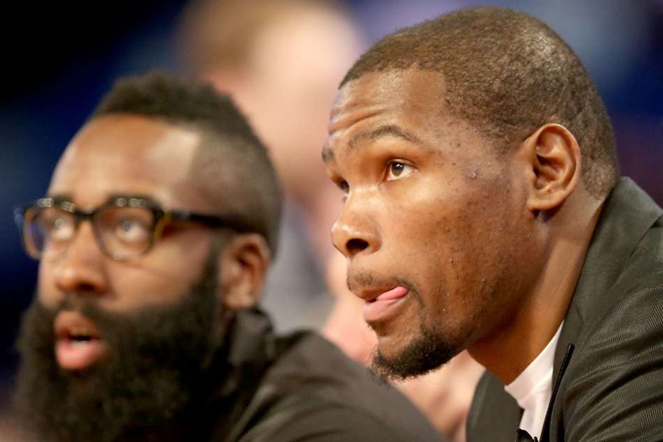 Kevin Durant (right) with James Harden Kevin Durant (right) with James Harden