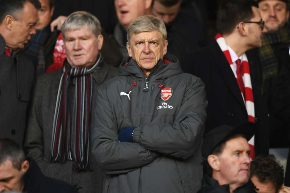 Arsene Wenger in the stands at City Ground Arsene Wenger in the stands at City Ground