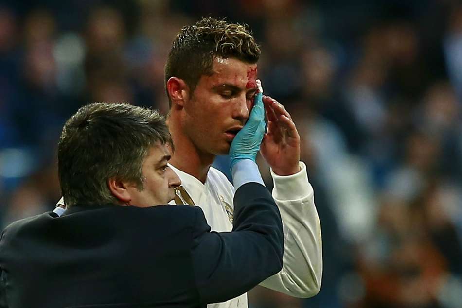 Real Madrid forward Cristiano Ronaldo receives treatment Real Madrid forward Cristiano Ronaldo receives treatment