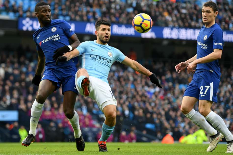 Manchester City's Sergio Aguero (centre) in action against Chelsea Manchester City's Sergio Aguero (centre) in action against Chelsea