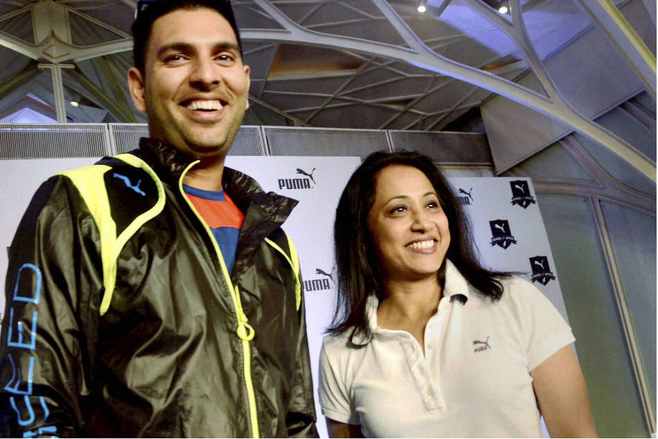 A file picture of Ashwini Nachappa (right), a vice-president of the Karnataka Amateur Athletics Association, with cricketer Yuvraj Singh