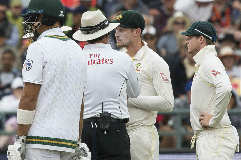 Australias Cameron Bancroft being confronted by umpires after being caught with a sandpaper during the third Test against South Africa in Cape Town