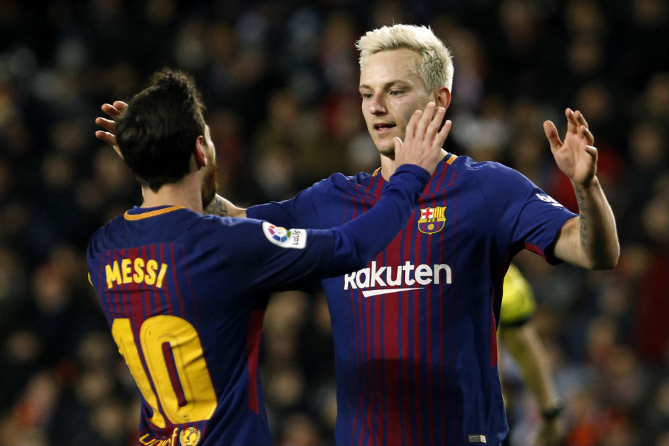 Barcelonas Lionel Messi and Ivan Rakitic celebrate Barcelonas Lionel Messi and Ivan Rakitic celebrate