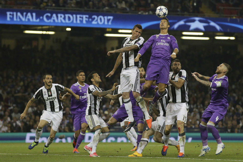File photo: Real Madrids Cristiano Ronaldo heads the ball with Juventus Mario Mandzukic during the Champions League final soccer match between Juventus and Real Madrid at the Millennium Stadium. File photo: Real Madrids Cristiano Ronaldo heads the ball with Juventus Mario Mandzukic during the Champions League final soccer match between Juventus and Real Madrid at the Millennium Stadium.