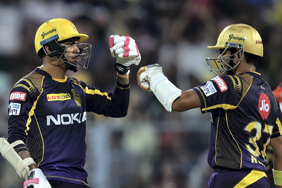 Sunil Narine (left) of Kolkata Knight Riders celebrates after reaching his fifty against Royal Challengers Bangalore during their IPL 2018 match at the Eden Gardens on Sunday