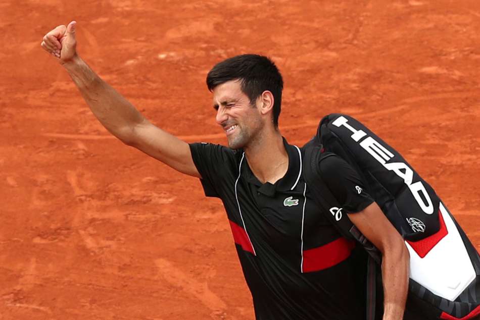 Novak Djokovic waves to the fans after being stunned by Marco Cecchinato Novak Djokovic waves to the fans after being stunned by Marco Cecchinato