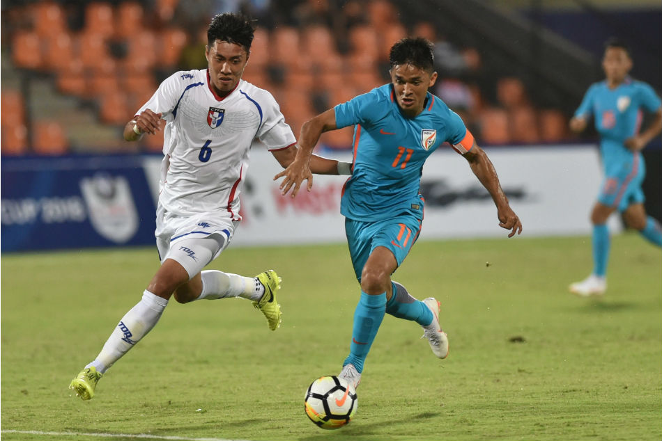 Indian player Sunil Chhetri (Blue jersey no. 11) and Chinese Taipei player Wei-Chuan Chen (White jersey no. 6) vie for the ball during the Hero Intercontinental football Cup in Mumbai. Indian player Sunil Chhetri (Blue jersey no. 11) and Chinese Taipei player Wei-Chuan Chen (White jersey no. 6) vie for the ball during the Hero Intercontinental football Cup in Mumbai.