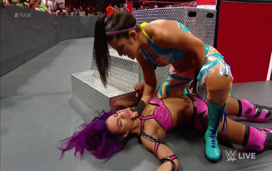 Bayley (up) & Sasha Banks (image courtesy Twitter) Bayley (up) & Sasha Banks (image courtesy Twitter)
