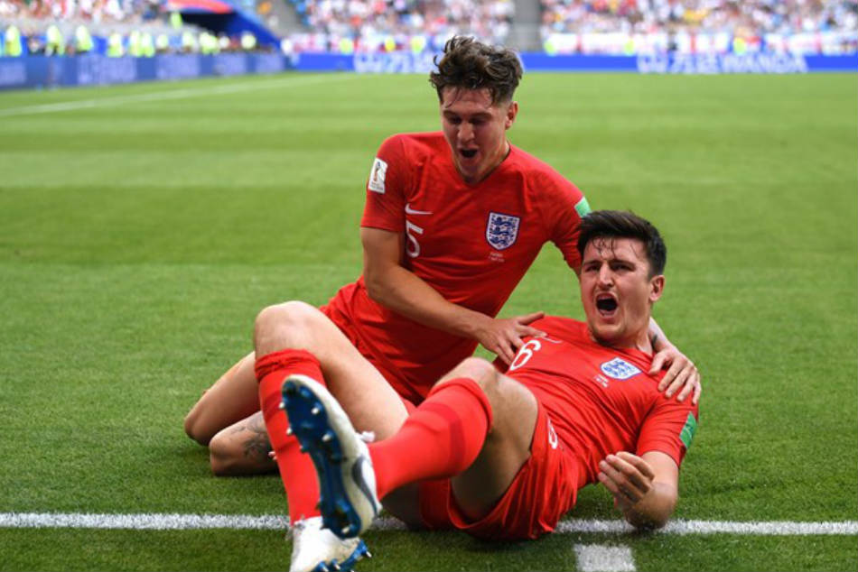Harry Maguire (right) of England is overjoyed after scoring against Sweden during their FIFA World Cup 2018 quarterfinal in Samara on Saturday (Image: FIFA.com)